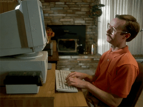 Man logging on to his computer to check out the weekly vibes.