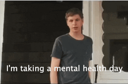 Man standing at a doorway saying "I'm taking a mental health day."