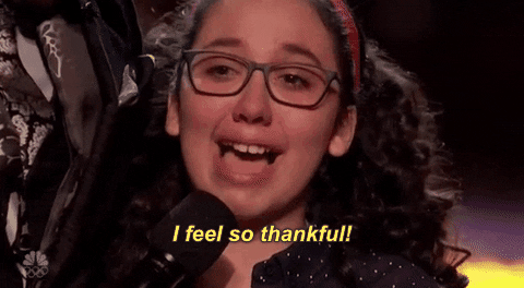 Young girl with glasses saying I feel so thankful