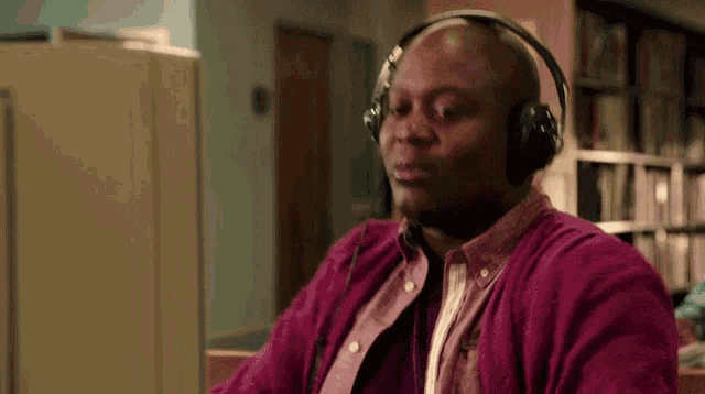 Man with headphones on listening to music