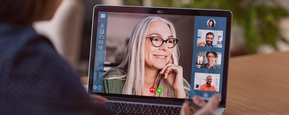 Four remote employees using a video conference platform to learn more about each other 