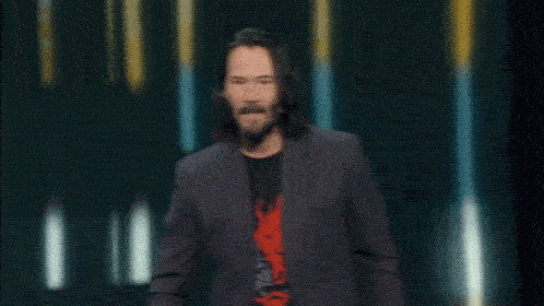 Keanu reeves moving hand and saying check this out