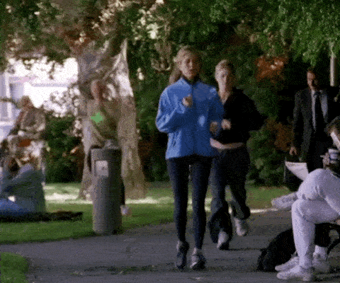 Women taking a jog through a park 