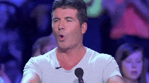 Simon Cowell clapping and saying woo